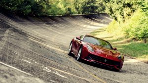 Обои для рабочего стола: Ferrari на повороте